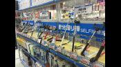 Don't worry, there is indeed an entire section devoted to selfie sticks.