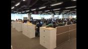 I might be jealous of the refreshing open floor plan of this work space.